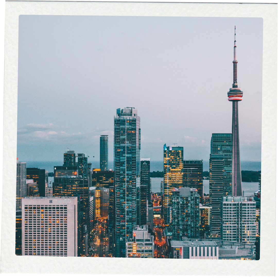 Toronto skyline at sunset over the water